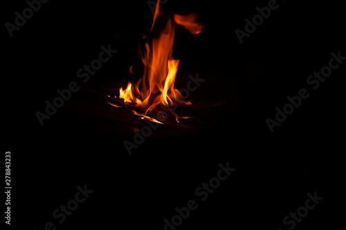 Red flames on black background taking photo with natural light environment taken with tripod in Cocoyoc Morelos Mexico