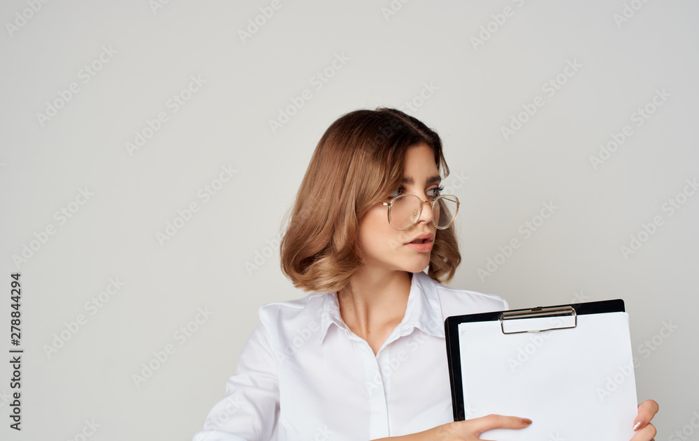 business woman holding a clipboard
