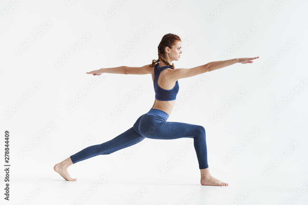 young woman jumping in the air young woman jumping in the air