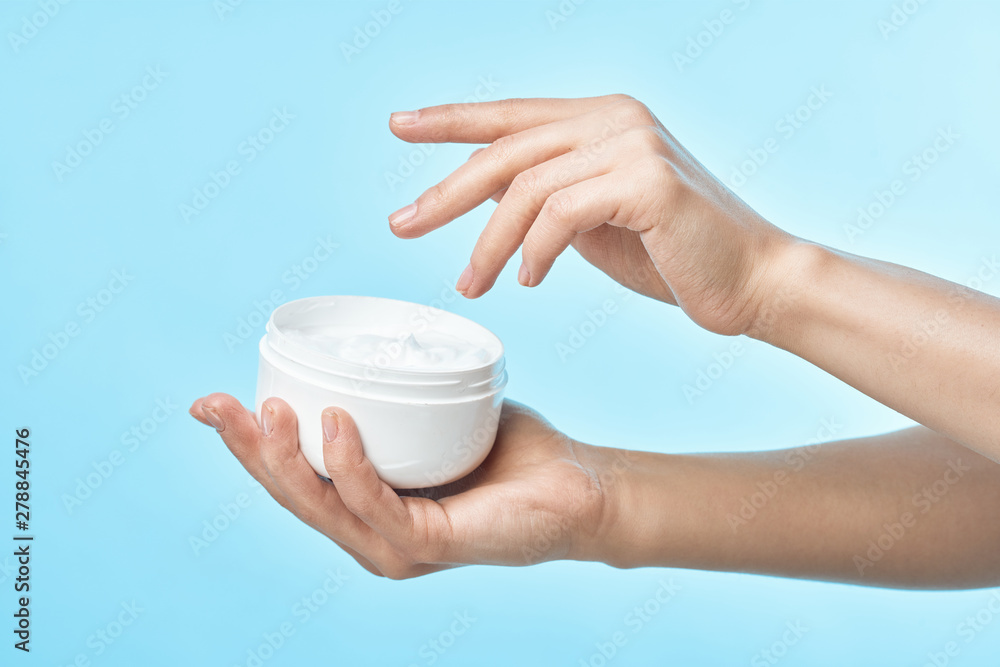 hands holding a cup of coffee hands holding a cup of coffee