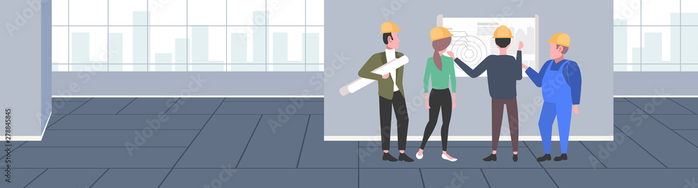 construction workers studying blueprint engineers team discussing new building project during meeting industrial technicians teamwork concept modern apartment interior full length horizontal