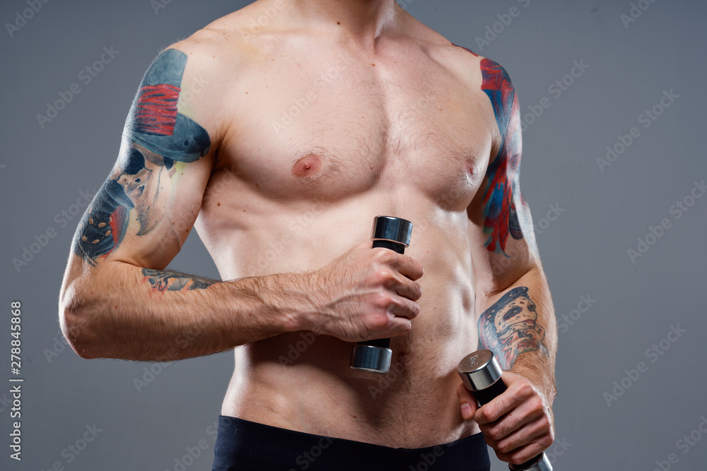 Naklejka premium man with dumbbells