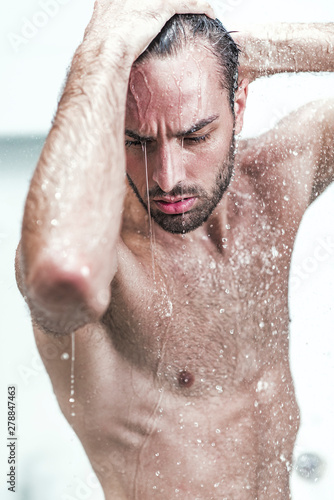 Attractive young guy taking a shower © Teodor Lazarev