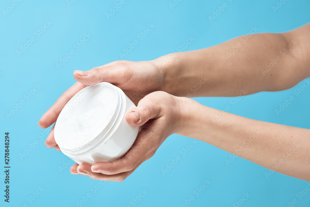 hand holding a cup of coffee hand holding a cup of coffee