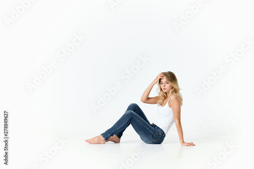 young woman sitting on the floor