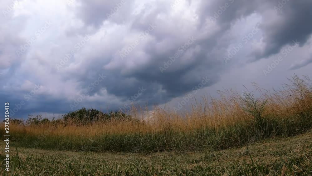 Storm brewing at countryside. Low angle. Time lapse Storm brewing at countryside. Low angle. Time lapse