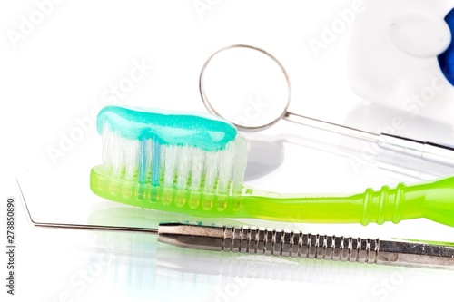 Toothbrush with Dental Instruments