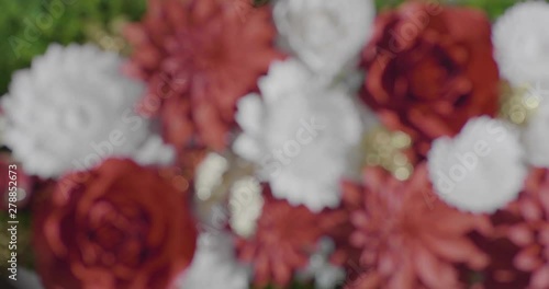 Paper flower backdrop going out of focus. photo