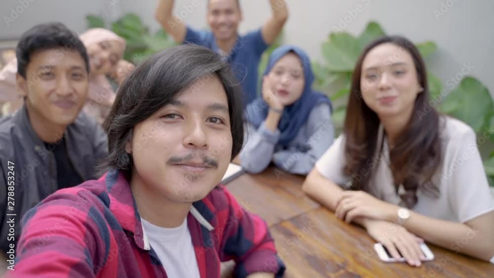 Group of friends office enjoy gathering and smiling while selfie together Group of friends office enjoy gathering and smiling while selfie together
