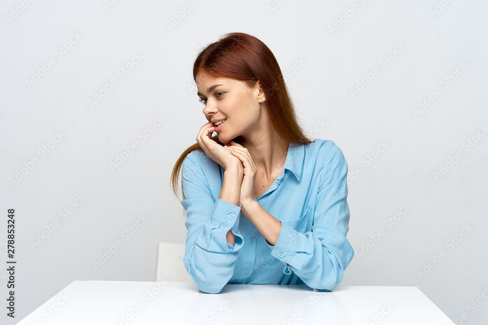 portrait of young woman sitting on sofa portrait of young woman sitting on sofa