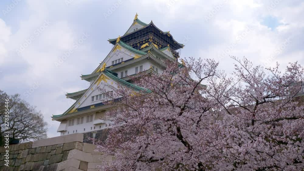 Osaka castle with cherry blossom. Japanese spring beautiful scene. Osaka castle with cherry blossom. Japanese spring beautiful scene.