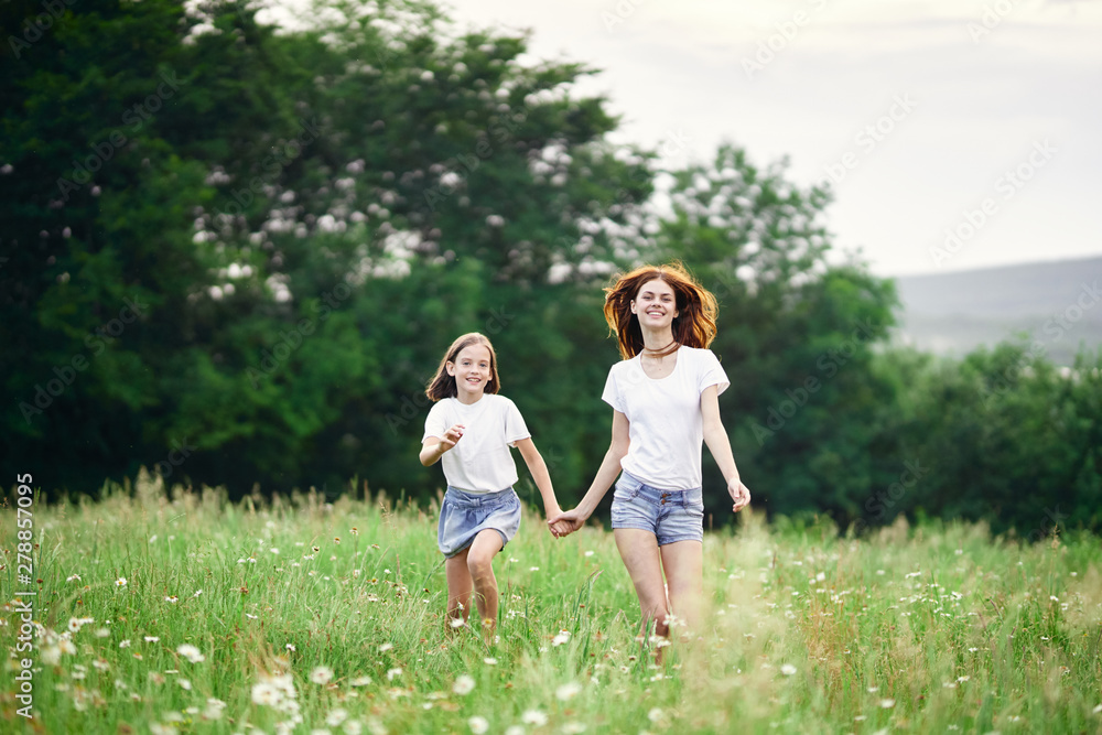 mother and daughter in the field