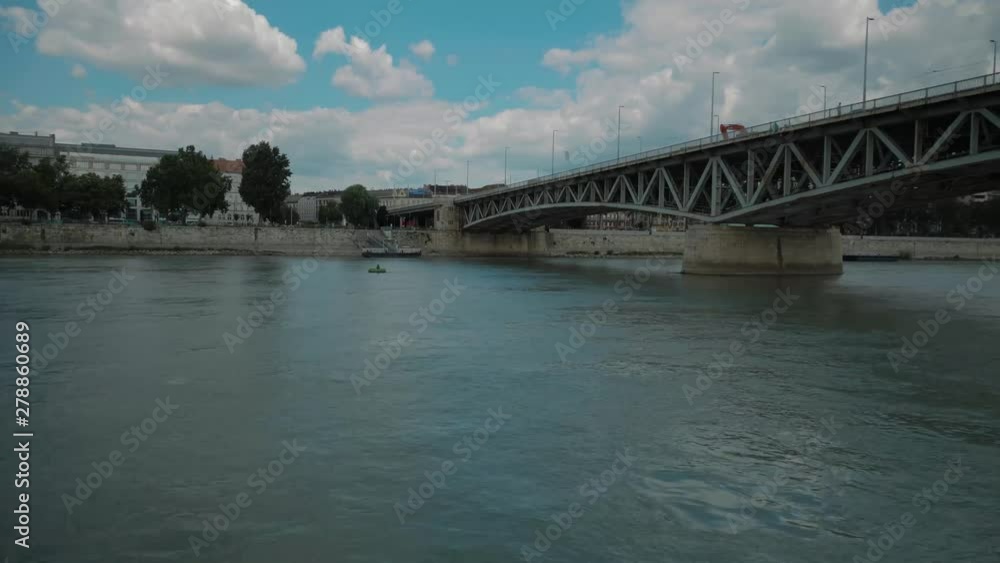 Boat ride through Danube, summer afternoon, going under Petofi bridge Boat ride through Danube, summer afternoon, going under Petofi bridge