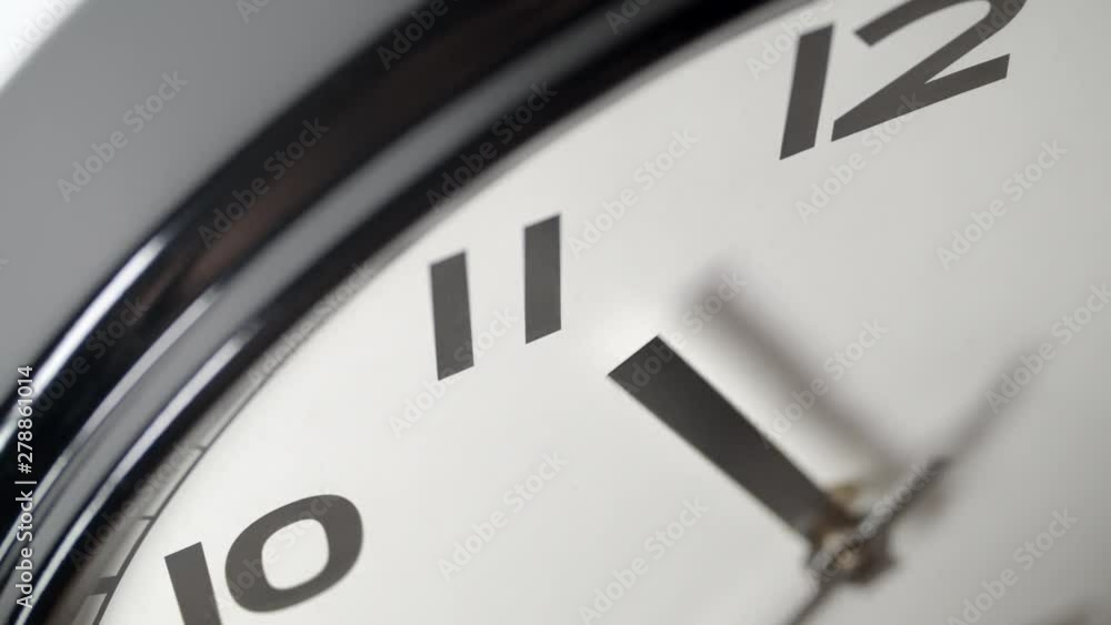Clock Face 3 Close Up in Time Lapse on Dark Grey Wall in Office Clock Face 3 Close Up in Time Lapse on Dark Grey Wall in Office