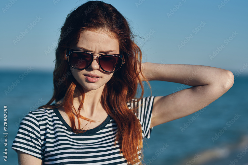 portrait of young woman in sunglasses portrait of young woman in sunglasses