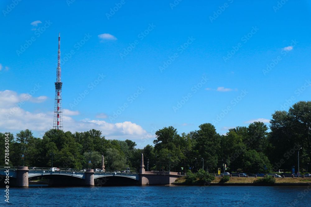View to Saint Petersburg tv tower with antennas and Neva river in the foreground
