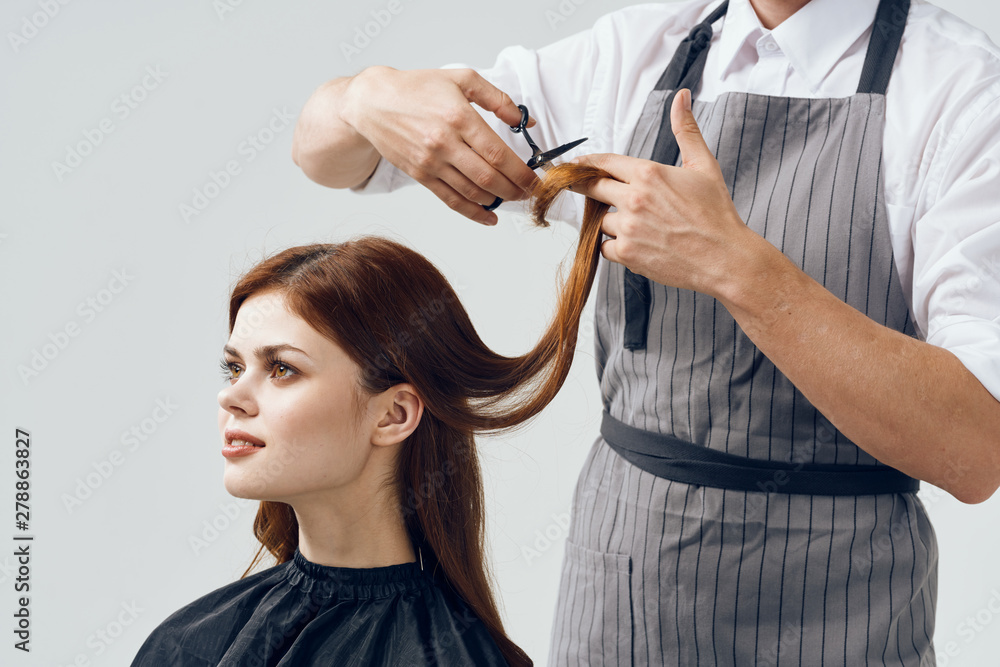hairdresser cutting hair with scissors hairdresser cutting hair with scissors