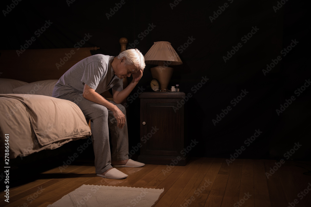 Depressed senior person sitting in bed cannot sleep from insomnia - obrazy, fototapety, plakaty 