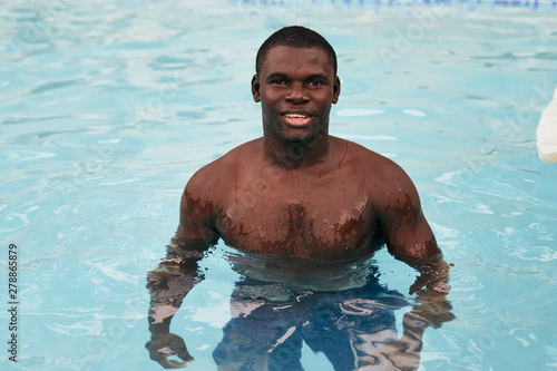 man in swimming pool © SHOTPRIME STUDIO