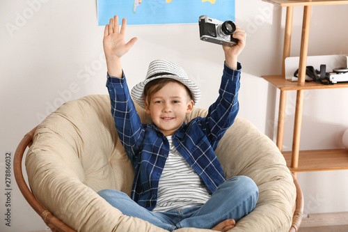 Cute little photographer wi...