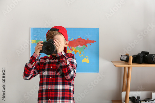 Cute little photographer wi...