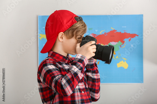Cute little photographer wi...