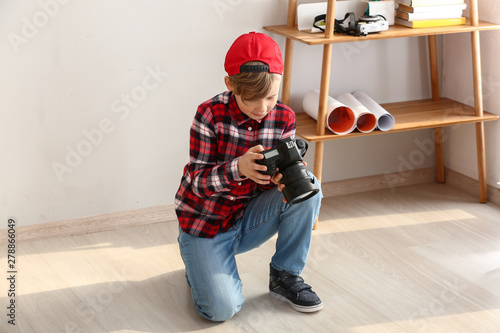 Cute little photographer wi...