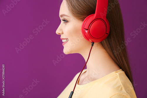 Smiling young woman enjoyin...