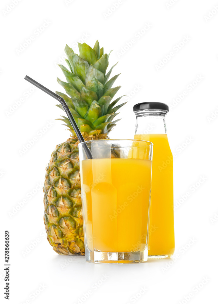 Glass and bottle of tasty pineapple juice on white background Glass and bottle of tasty pineapple juice on white background