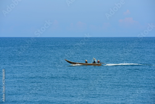 Sea view and small fishing boat at sea, Thailand