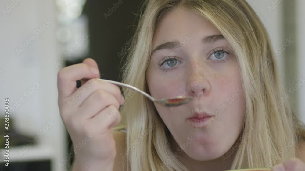 cute teenager girl eyes and face eating watermelon close up blue eyes in slow motion cute teenager girl eyes and face eating watermelon close up blue eyes in slow motion