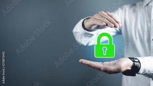 Man protect green padlock. Security concept