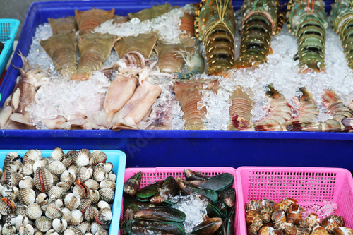 Fresh lobster and seafood on street food can be seen in Thailand and tourist attractions photo