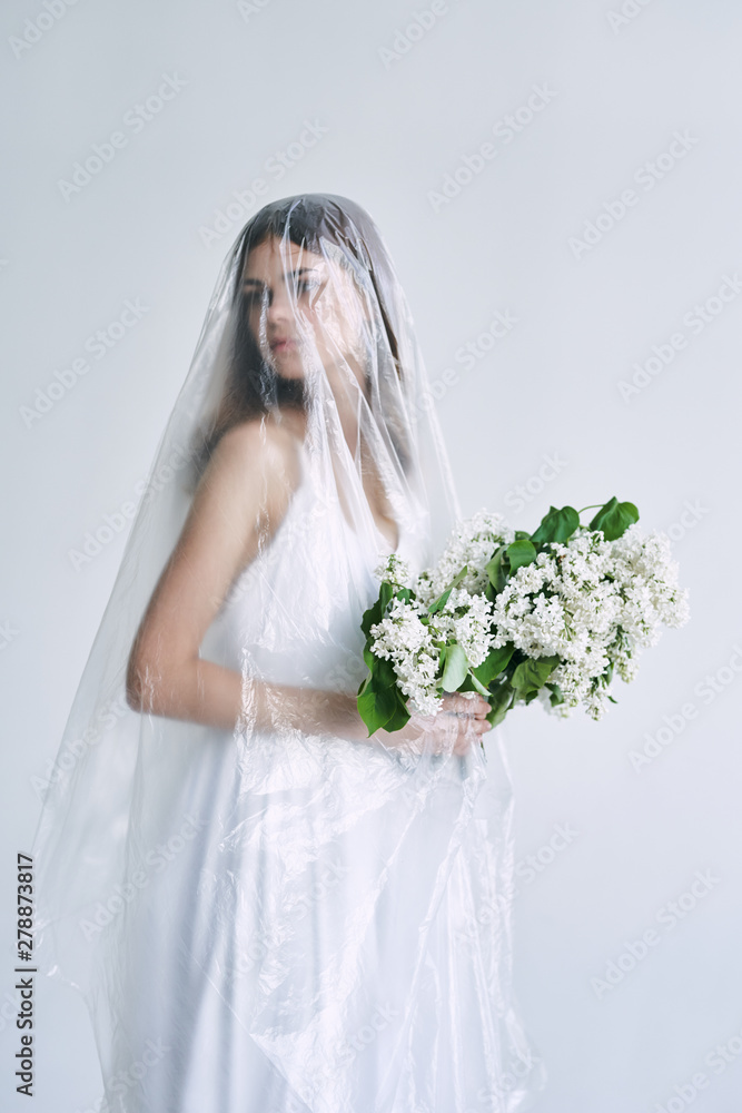 bride in white dress with bouquet of flowers bride in white dress with bouquet of flowers