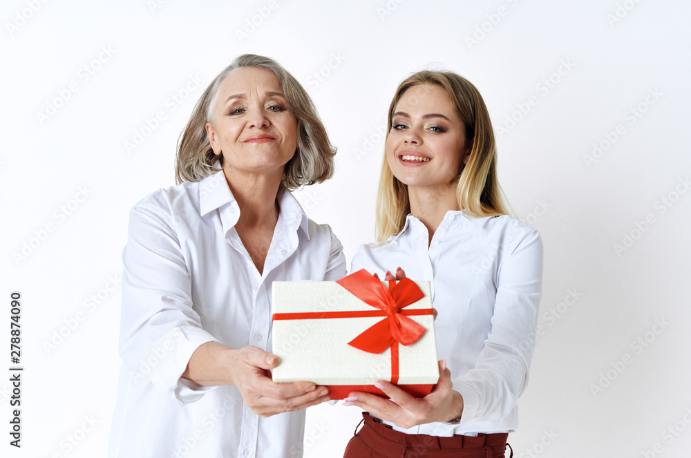 two women with gift two women with gift