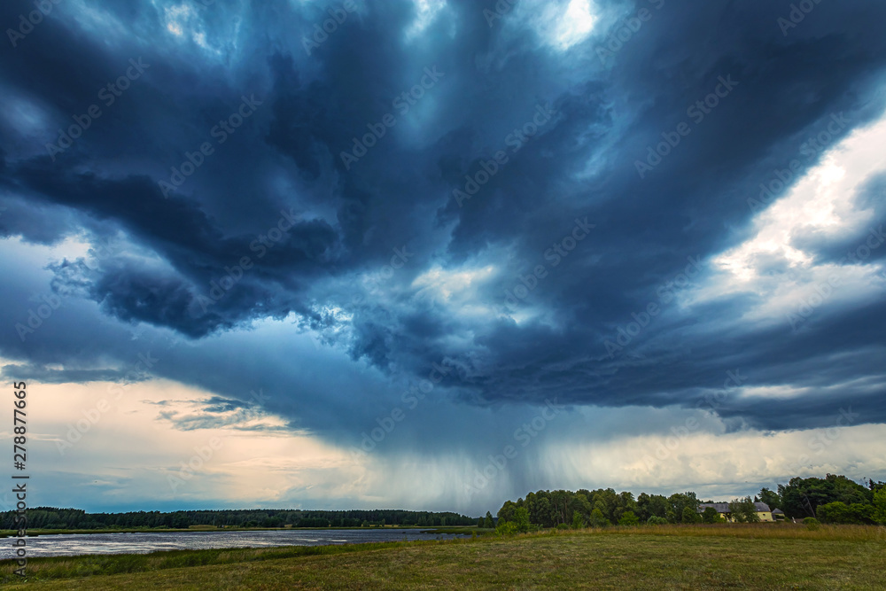 Severe storm clouds with micro burst rain Severe storm clouds with micro burst rain
