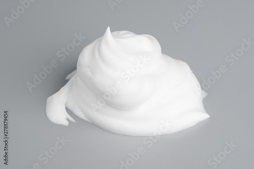Soap foam shave cream isolated on gray background object beatuy health care concept