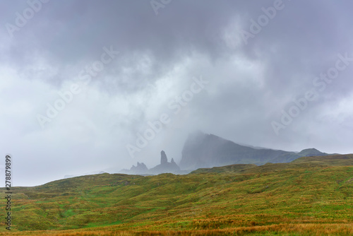Early morning fog covers The Old Man of Storr , Isle of Skye , Scotland