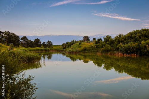 beautiful daytime summer landscape with a lake