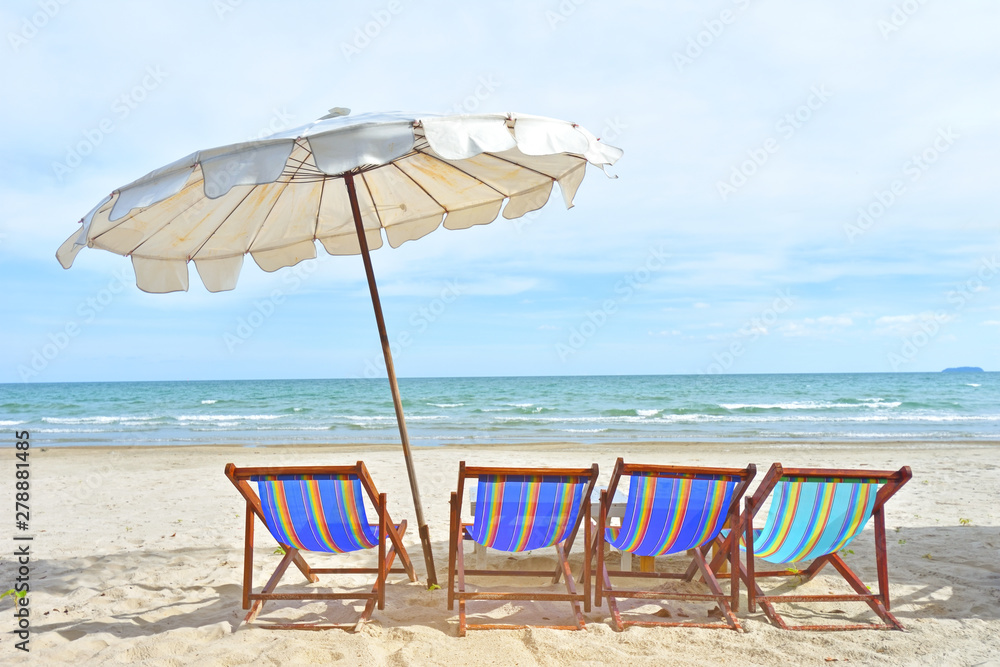 Tropical beach background as summer landscape with beach chairs