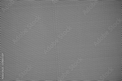 Small black dots that look at the be dazzled of many black dots of metal plates.