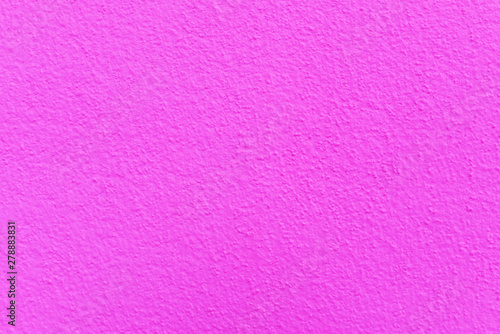 Pink cement or concrete wall texture for background. High resolution through process retouch.