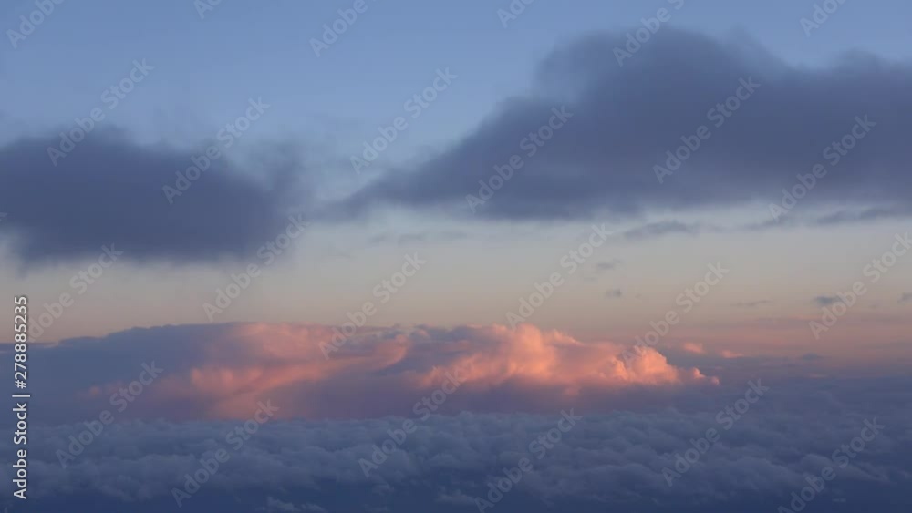 Flying over clouds with sunlight, Airplane view. 4K video footage Flying over clouds with sunlight, Airplane view. 4K video footage