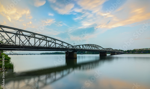 Dawn at Trang Tien Bridge. This is a Gothic architectural bridge spanning the Perfume river from the 18th century designed by Gustave Eiffel in Hue  Vietnam