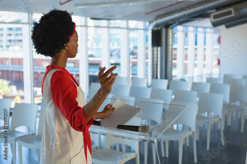 Female executive practicing her speech in the conference room