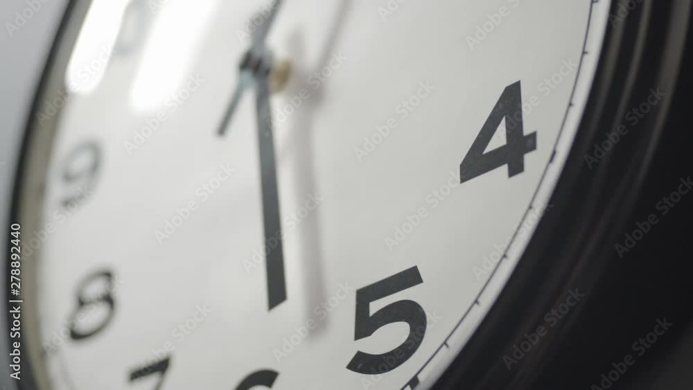 Clock Face Close Up in Time Lapse on Wall in Office Clock Face Close Up in Time Lapse on Wall in Office