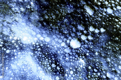 Quadro su tela Bubbles in the water foam resembling the universe