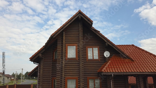 Wallpaper Mural Beautiful wooden European house from a bar in the village. Torontodigital.ca