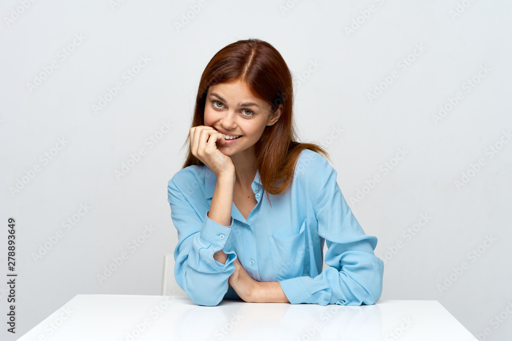 portrait of young woman sitting on sofa portrait of young woman sitting on sofa