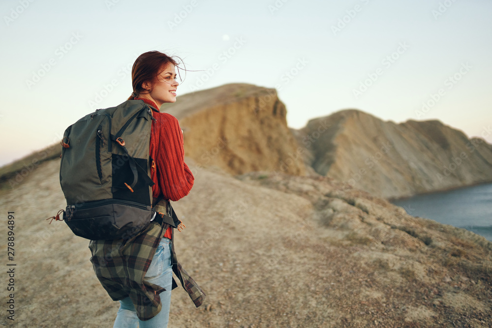 woman hiking in the mountains woman hiking in the mountains